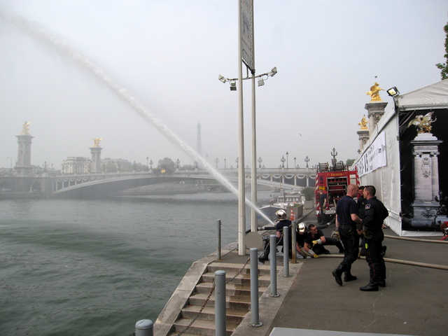 Pompiers testing their hoses and pumps